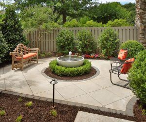 Backyard garden patio with water fountain